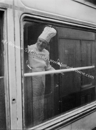 LADY AT CARRIAGE WINDOW